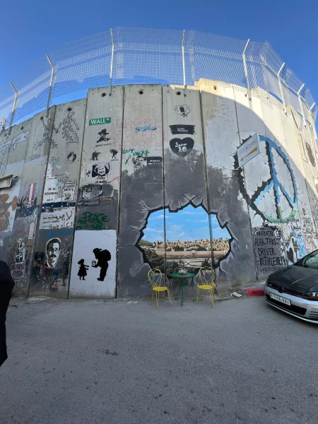 Wall between Jerusalem and Bethlehem is stapled with protests for change.