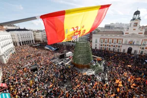 Why are the Spanish people protesting in the streets?